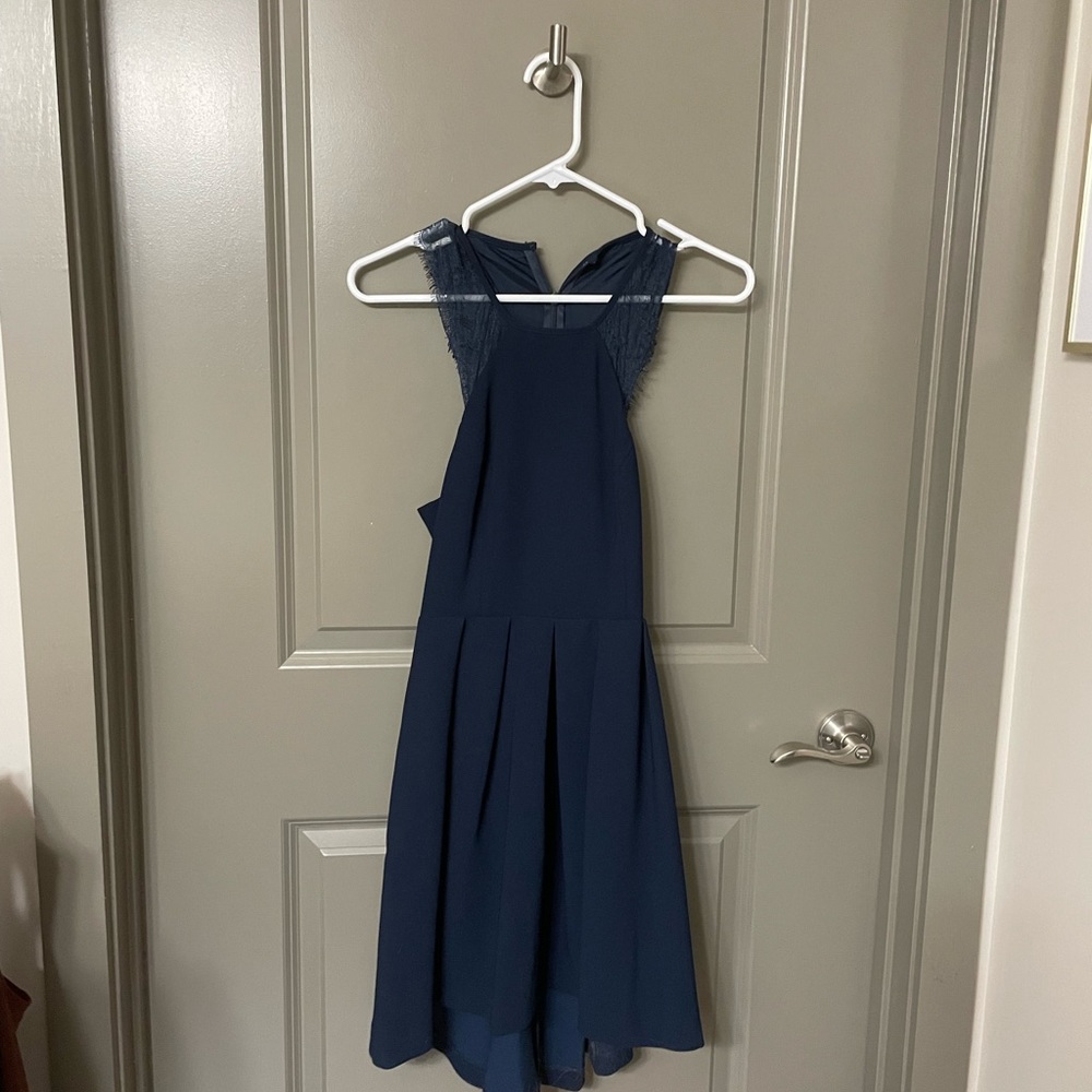BCBG navy cocktail dress in a size 2. Worn once!